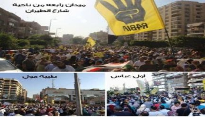 ثوار يبكون ويقبلون تراب رابعة بعد وصول عدد من المسيرات إلى محيطها رغم إرهاب جيش السيسي