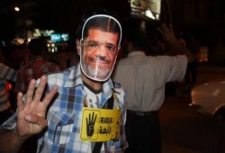 بالصور أهالي وطلاب بندر الفيوم في سلاسل بشرية ليلية رفضا للانقلاب