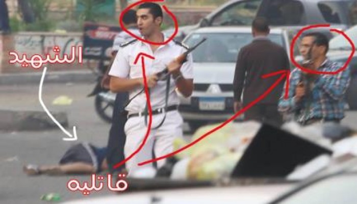 صورة الشهيد وقاتليه "قتلهم الله"