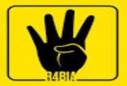 صور الرئيس مرسي وشارات رابعة تملأ حوائط وبوابات الجامعة