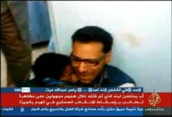 شاهدة عيان: 5 بلطجية خطفوا الطفل من أبيه بعد استشهاده (فيديو)