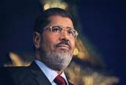 "حملة الشعب يدافع عن الرئيس": "الدكتور محمد مرسي" سيواصل نضال "مانديلا"