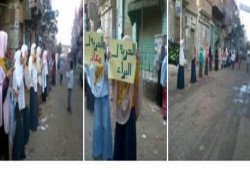 سلسلة بشرية لحركة نساء ضد الانقلاب بالفيوم