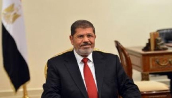وصول الرئيس مرسي إلى مقر المحاكمة