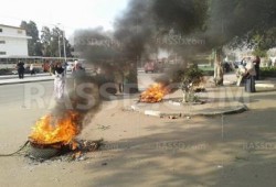 طالبات الأزهر يشعلن النيران لتفادي الاختناق بالغاز المسيل للدموع وتزايد الاصابات بالخرطوش