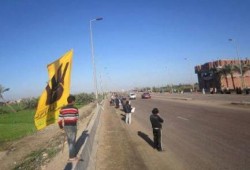 سلسلة بشرية صباحية ضد الانقلاب بدمياط على الطريق الدولي