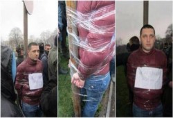 بعد نجاح ثورتهم: ثوار اوكرانيا يقيدون مدير أحد الجمارك لتورطه في الفساد