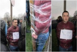 بعد نجاح ثورتهم: ثوار اوكرانيا يقيدون مدير أحد الجمارك لتورطه في الفساد