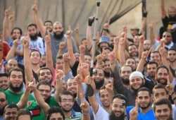 صورة وتعليق من اعتصام رابعة وجوه ناضرة بين شهيد وجريح ومعتقل ومطارد