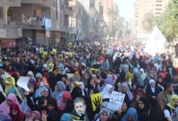 أهالى غرب الإسكندرية ينظمون مسيرة حاشدة بمنطقة الهانوفيل رفضاً للانقلاب العسكرى.