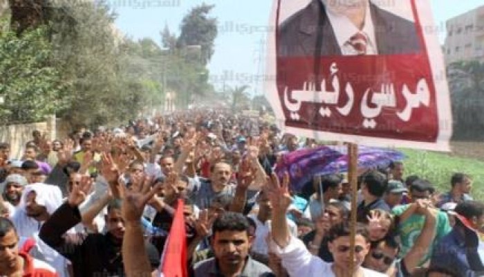 "معا للخلاص" كلاب الشرطة يطلقون الغاز والخرطوش علي المتظاهرين بأسيوط