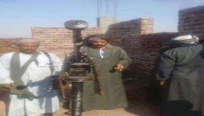 نشطاء يتداولون صور لمسلحين بالأسلحة الثقيلة أعلى المنازل بأسوان