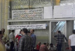 عمال "الشركة الوطنية" يضربون عن العمل.. ويتوعدون محلب بمحطة "رمسيس"