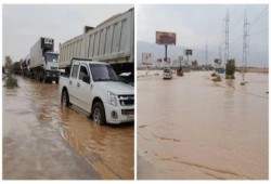 مياه الأمطار تتسبب في قطع طريق العين السخنة