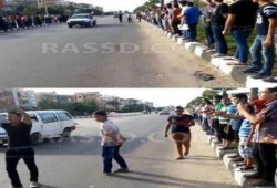 سلسلة بشرية لـ "شباب ضد الانقلاب" بدمياط الجديدة