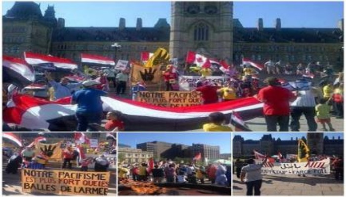 بالصور : الجالية المصرية في كندا تنظم وقفة ضد الانقلاب في أكبر ميادينها