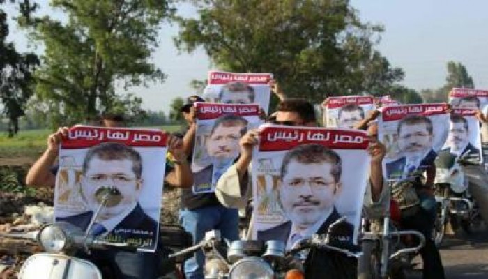 بالصور : مسيرة بالدرجات النارية ضد الانقلاب رافعين صور الرئيس مرسي بكفر صقر - الشرقية