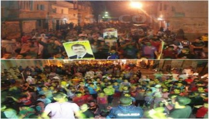 مسيرة ليلية بـ" حوش عيسى" رفضًا للانقلاب.