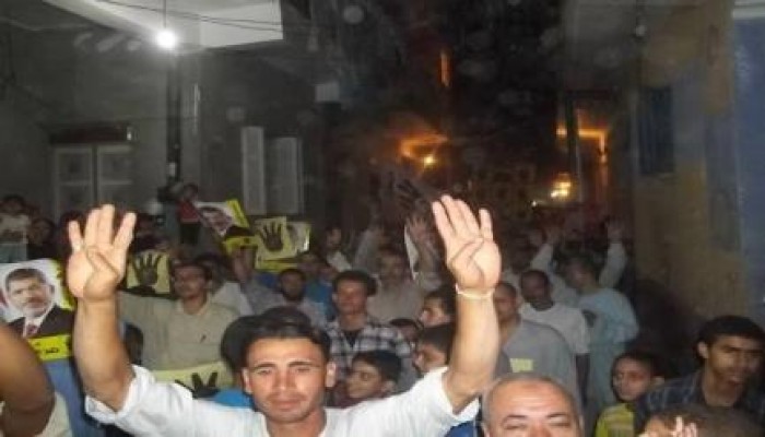 الجيزة - بالصور : ثوار المنصورية ينظمون مسيرة حاشدة ضد الانقلاب وصور الرئيس مرسي تتصدر