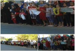 دمياط: سلسلة بشرية لثوار الخياطة للتنديد بالاعتداء على الحرائر بمعتقلاب الانقلاب (صور)