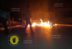 الغربية - بالصور :  ثوار ‫الغربية‬ يقطعون طريق "المحلة الكبرى"