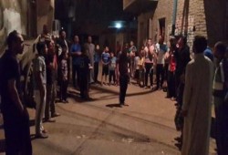 الدقهلية - بالصور :  وقفة ليلية بقرية "الحواوشة" تنديداً بالحكم العسكري وإعتقال