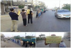 الدقهلية - بالصور : سلسلة بشرية صباحية للأهالي بـ "منية سندوب" .