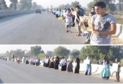 الشرقية - بالصور : سلسلة بشرية صباحية بكفر صقر ضمن فعاليات أسبوع مصر مش معسكر