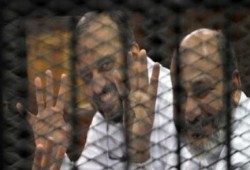 الدفاع عن البلتاجي وحجازي ينسحب من القضية الملفقة بتعذيب ضابط بسبب القاضي الانقلابي