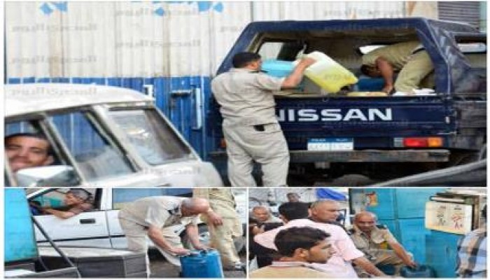 بالصور : سيارات الداخلية تحصل على البنزين بـ جراكن رغماً عن الجميع!