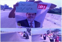 سلسلة بشرية لثوار البصارطة بدمياط رفضاً للانقلاب العسكري