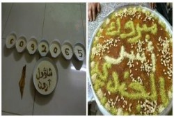 بالصور:أهالي ‫‏غزة‬ يبدعون في إبداء فرحتهم بأسر الجندي الصهيوني بالحلوي