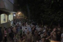 بالصور : قرية بأكملها تخرج في الجيزة بمسيرة ضد الانقلاب في ليلة القدر