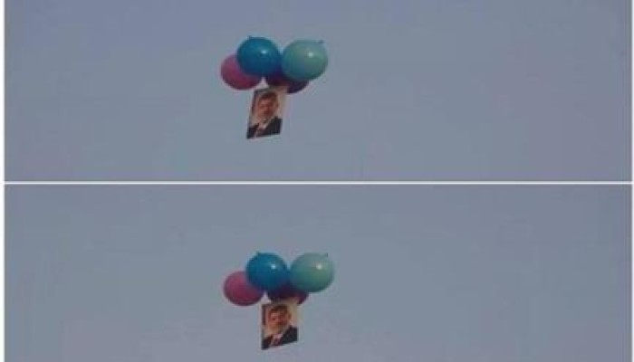 صور الرئيس محمد مرسي في سماء القاهرة أول أيام العيد