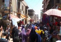 بالصور .. مسيرة حاشدة بسمالوط في ذكرى المذبحة