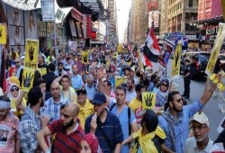 مظاهرة حاشدة في ذكرى مجزرة رابعة بأشهر ميدان في العالم بنيو يورك - أمريكا