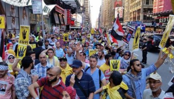 مظاهرة حاشدة في ذكرى مجزرة رابعة بأشهر ميدان في العالم بنيو يورك - أمريكا