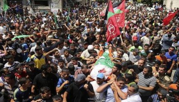 بالصور .. تشييع جثمان الشهيدة زوجة قائد القسام "محمد الضيف" ونجله "علي"