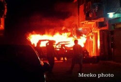 بالصور : مجهولون يحرقون عربة شرطة بشارع فيصل بـ الجيزة