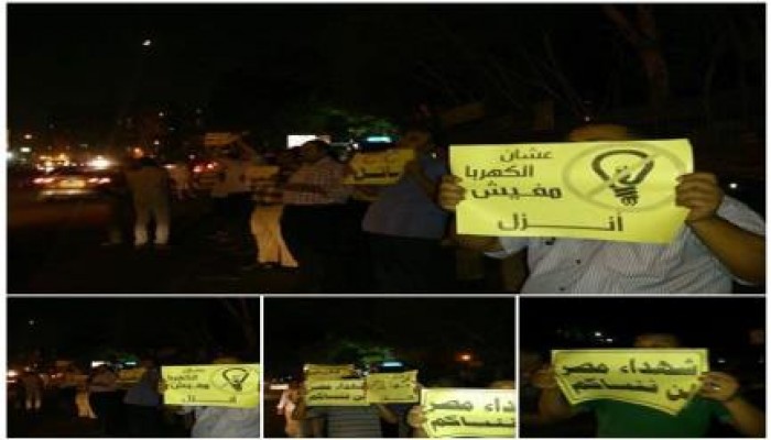 بالصور : الثوار ينظمون وقفة ضد الانقلاب أمام مدخل الدويقة أحد أكبر معاقل الحزب الوطني