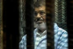 الرئيس مرسي يجدد عدم اعترافه بالمحكمة في قضية وادي النطرون الملفقة