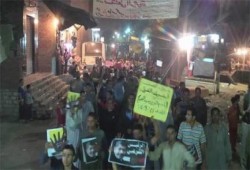 صور الرئيس مرسى تتصدر مسيرة الصف المندده بالانقلاب