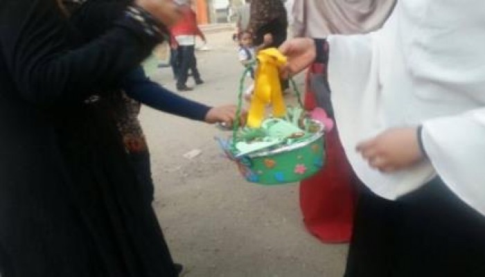 "كلنا واحد" حملة للشهداء والمعتقلين بأول أيام العيد في أسيوط