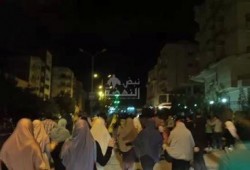 مسيرة ليلية بأكتوبر تحرق علم "الكيان الصهيوني"