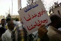 عمال "طنطا للكتان" يهددون بتشغيل شركتهم بالقوة