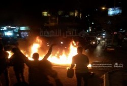 بالصور .. مجهولون يقطعون شارع سوريا بالقرب من مصطفى محمود بالمهندسين