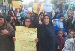 والدة «شهيد الميمون»تتصدر مسيرة «انتفاضة السجون» فى بني سويف