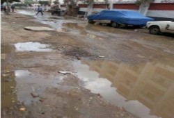 البحيرة: بالصور قرية "دسونس أم دينار تغرق بمياه الصرف الصحى