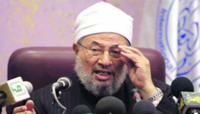 300 عالم يطالبون برفع اسم الإمام القرضاوي من قوائم الانتربول