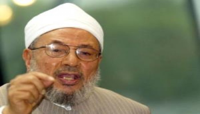القرضاوى مطلوبا